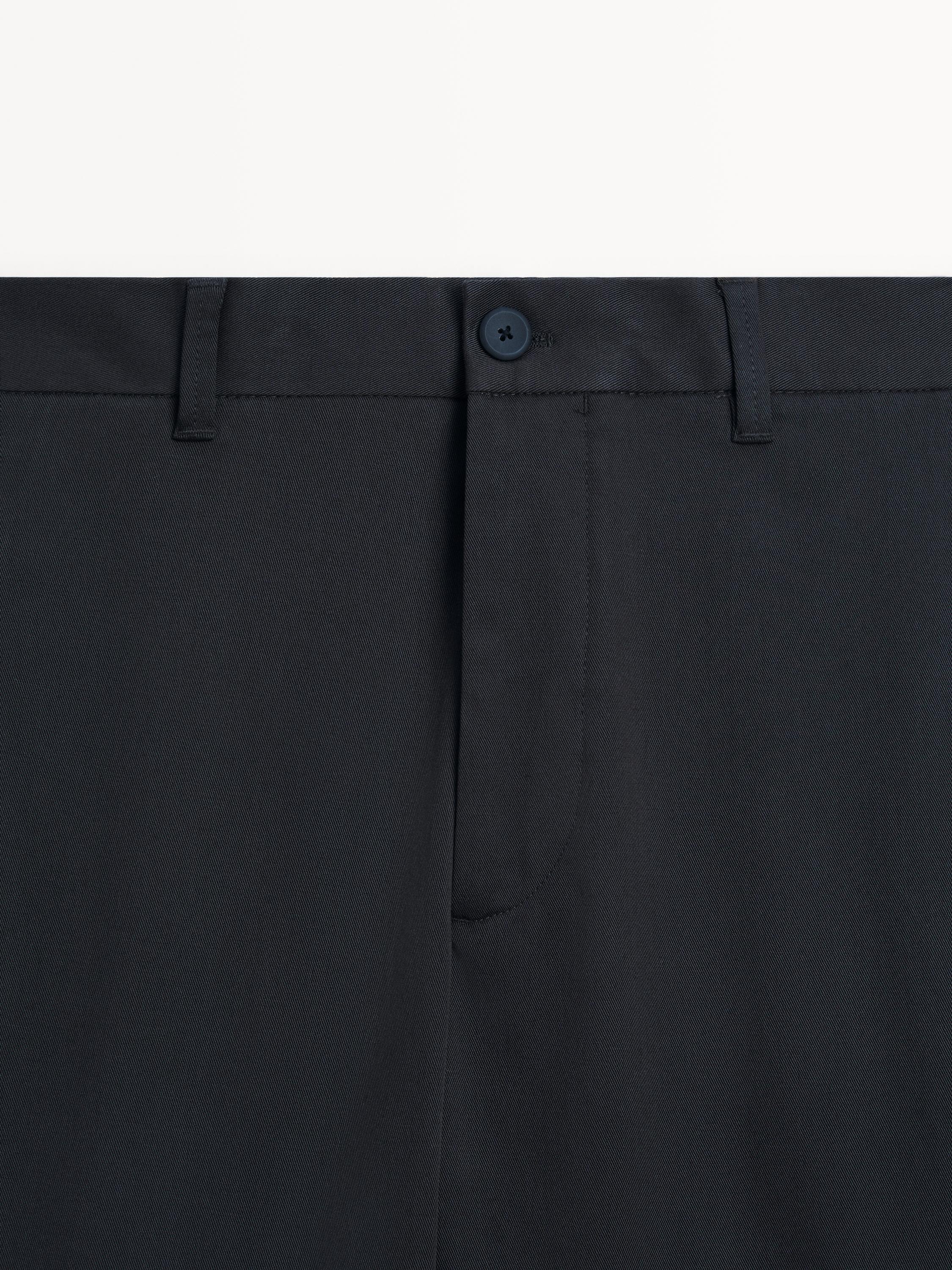 Pantalon tapered fit en coton mélang